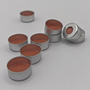 Group of silver 11 mm crimp caps showing open-top and underside views
