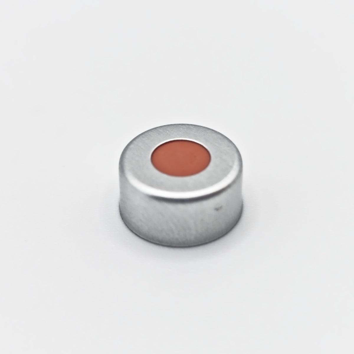 Single silver 11 mm open-top crimp cap with red-orange septum