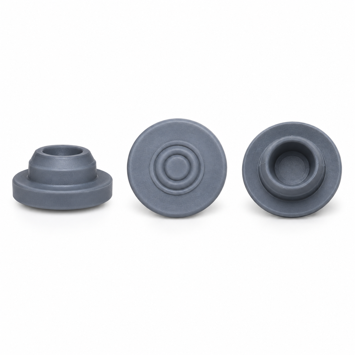 20 mm molded grey butyl injection stoppers shown from three angles